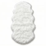 Faux fur sheepskin rug in white and yellow, shown flat from above in its natural pelt shape