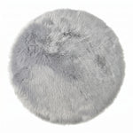 Faux fur sheepskin rug in white and yellow, shown flat from above in its natural pelt shape