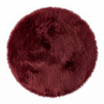 Faux fur sheepskin rug in white and yellow, shown flat from above in its natural pelt shape