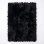 Faux fur sheepskin rug in white and yellow, shown flat from above in its natural pelt shape