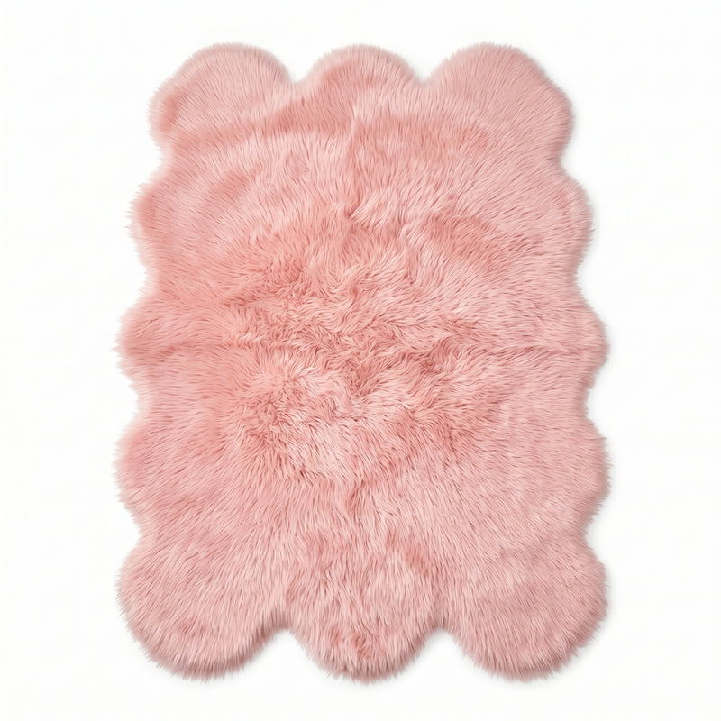 Faux fur sheepskin rug in white and yellow, shown flat from above in its natural pelt shape