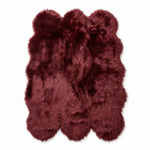 Faux fur sheepskin rug in white and yellow, shown flat from above in its natural pelt shape