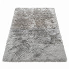 Faux fur sheepskin rug in white and yellow, shown flat from above in its natural pelt shape
