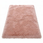 Faux fur sheepskin rug in white and yellow, shown flat from above in its natural pelt shape