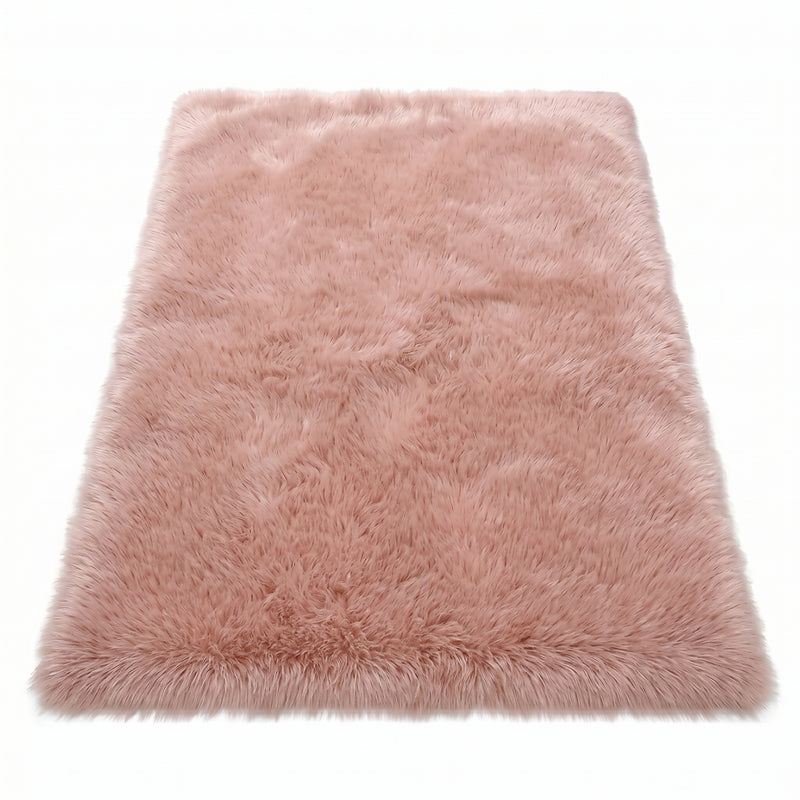 Faux fur sheepskin rug in white and yellow, shown flat from above in its natural pelt shape