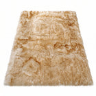 Faux fur sheepskin rug in white and yellow, shown flat from above in its natural pelt shape