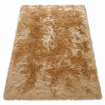 Faux fur sheepskin rug in white and yellow, shown flat from above in its natural pelt shape