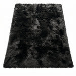 Faux fur sheepskin rug in white and yellow, shown flat from above in its natural pelt shape