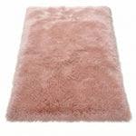 Faux fur sheepskin rug in white and yellow, shown flat from above in its natural pelt shape