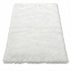 Faux fur sheepskin rug in white and yellow, shown flat from above in its natural pelt shape