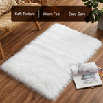 White fluffy faux sheepskin rug in bedroom beside bed — bedside rug placement