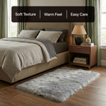White fluffy faux sheepskin rug in bedroom beside bed — bedside rug placement