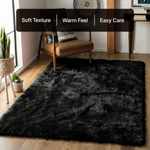 White fluffy faux sheepskin rug in bedroom beside bed — bedside rug placement