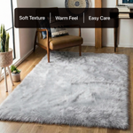 White fluffy faux sheepskin rug in bedroom beside bed — bedside rug placement