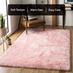 White fluffy faux sheepskin rug in bedroom beside bed — bedside rug placement