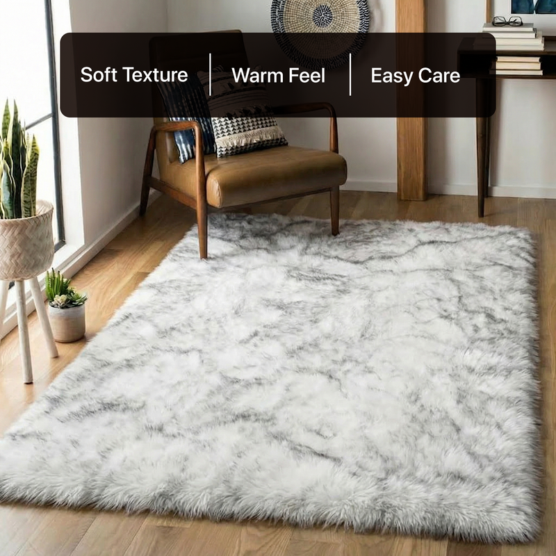 White fluffy faux sheepskin rug in bedroom beside bed — bedside rug placement