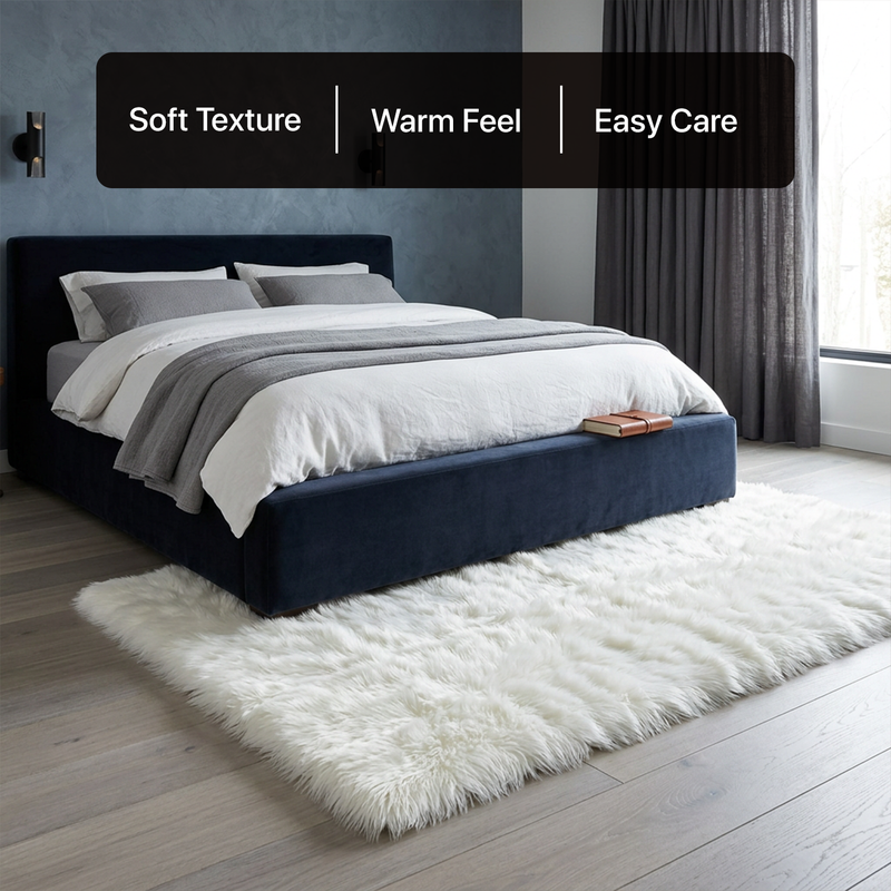 White fluffy faux sheepskin rug in bedroom beside bed — bedside rug placement