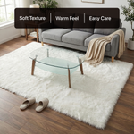 White fluffy faux sheepskin rug in bedroom beside bed — bedside rug placement