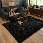 Ultra-soft faux sheepskin area rug in white placed in living room beside armchair