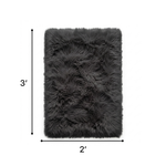 Faux sheepskin fluffy area rug detail shot showing non-slip suede backing
