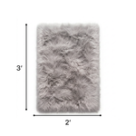 Faux sheepskin fluffy area rug detail shot showing non-slip suede backing