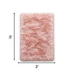 Faux sheepskin fluffy area rug detail shot showing non-slip suede backing