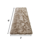 Faux sheepskin fluffy area rug detail shot showing non-slip suede backing