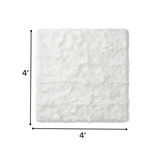 Faux sheepskin fluffy area rug detail shot showing non-slip suede backing