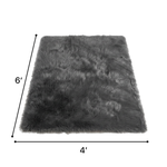 Faux sheepskin fluffy area rug detail shot showing non-slip suede backing