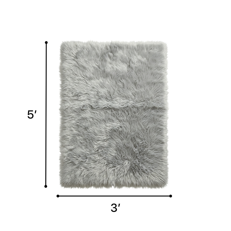 Faux sheepskin fluffy area rug detail shot showing non-slip suede backing