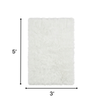 Faux sheepskin fluffy area rug detail shot showing non-slip suede backing