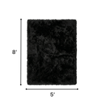 Faux sheepskin fluffy area rug detail shot showing non-slip suede backing