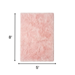 Faux sheepskin fluffy area rug detail shot showing non-slip suede backing