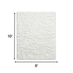 Faux sheepskin fluffy area rug detail shot showing non-slip suede backing