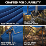 Two campers carrying the foldable camping chair in its carry bag, showing the quick-fold portable design at 9.3 lb
