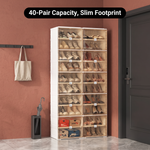 Front view of a foldable shoe cabinet storing shoes in a hallway beside a potted plant