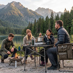 Woman setting drinks on an aluminum folding camping table outdoors