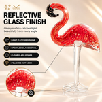 Glass flamingo figurine shown as a gift with birthday and holiday icons