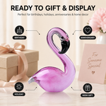 Glass flamingo figurine shown as a gift with birthday and holiday icons