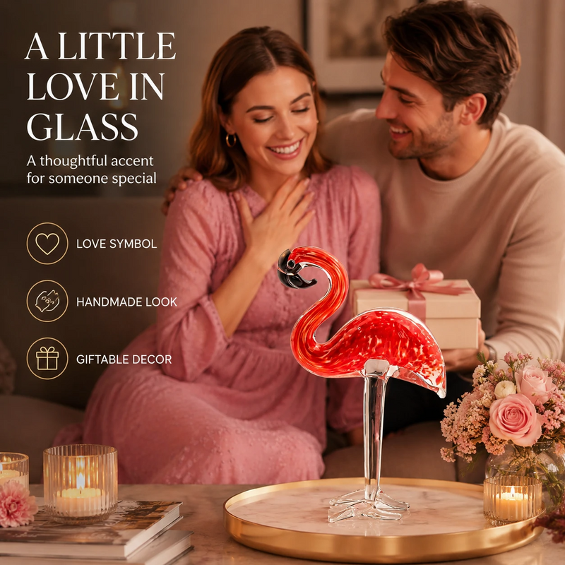 Glass flamingo figurine presented as a romantic gift with a card and flowers