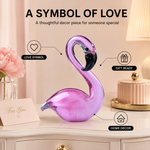 Glass flamingo figurine presented as a romantic gift with a card and flowers