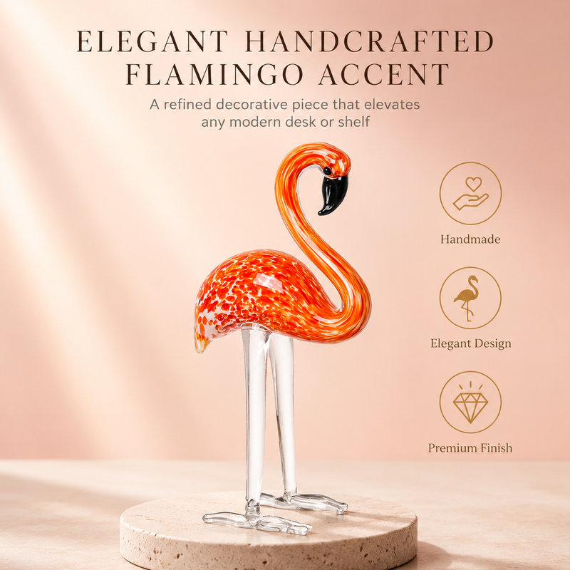 Hand-blown pink glass flamingo figurine with curved neck in sitting pose