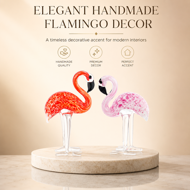 Hand-blown pink glass flamingo figurine with curved neck in sitting pose