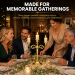 People gathered at a formal dinner table with a lit gold candelabra centerpiece