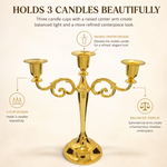 Lit white taper candles in a gold candelabra styled for formal décor