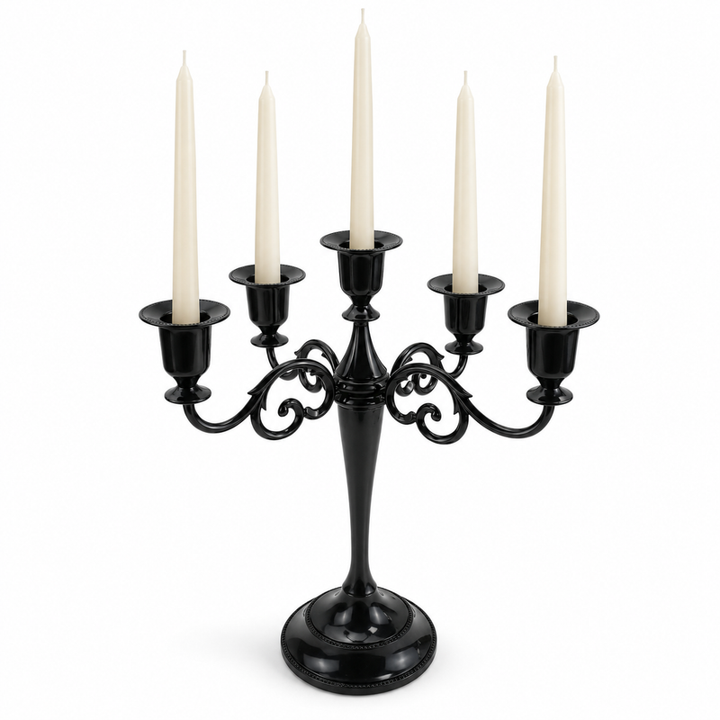 Gold three-arm metal candelabra candle holder on a white background