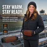 Person wearing a camouflage hand warmer pouch at the waist in a frosty field
