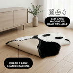 Care features graphic showing anti-skid backing - machine washable and easy spot clean