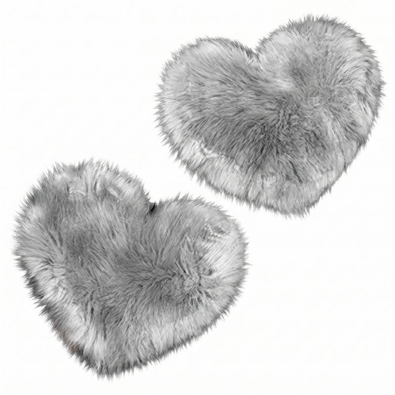 Rose red double attached heart shaped faux fur rug on a white background