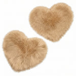 Rose red double attached heart shaped faux fur rug on a white background